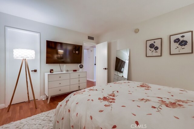 18350 Hatteras St Unit 263, Tarzana, CA 91356 - bedroom featuring wood finished floors and baseboards