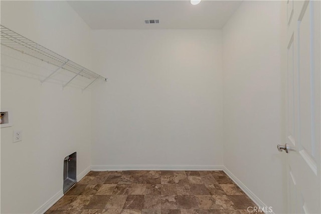 24679 Acadia Dr, Corona, CA 92883 - washroom with washer hookup and stone finish floors