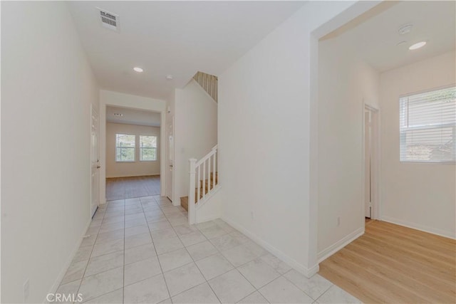 24679 Acadia Dr, Corona, CA 92883 - hallway featuring light tile patterned floors and recessed lighting