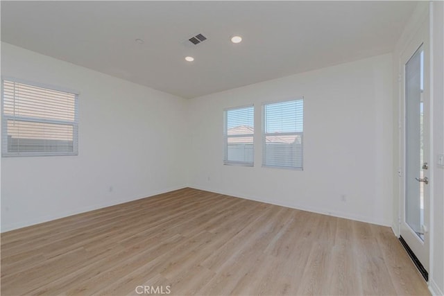 24679 Acadia Dr, Corona, CA 92883 - spare room featuring light wood finished floors and recessed lighting