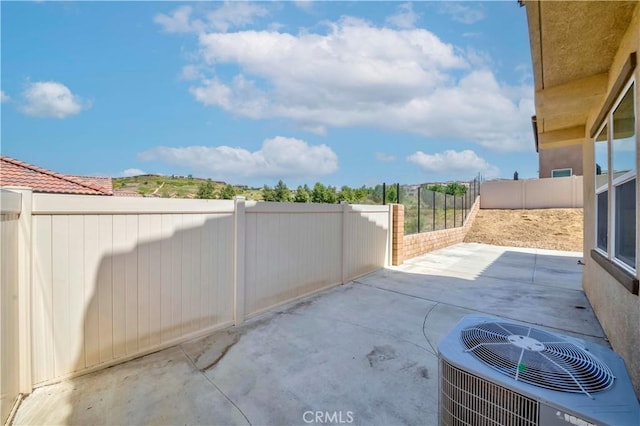 24679 Acadia Dr, Corona, CA 92883 - fenced backyard featuring a patio area