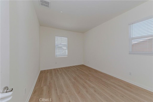 24679 Acadia Dr, Corona, CA 92883 - empty room featuring light wood-type flooring and baseboards