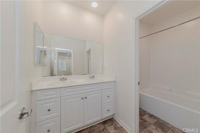 24679 Acadia Dr, Corona, CA 92883 - full bathroom featuring double vanity and shower / washtub combination