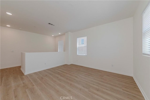 24679 Acadia Dr, Corona, CA 92883 - unfurnished room with light wood-style floors and recessed lighting