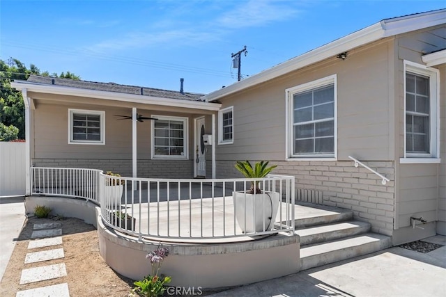 5337 Canehill Ave, Lakewood, CA 90713 - rear view of house featuring brick siding and a ceiling fan