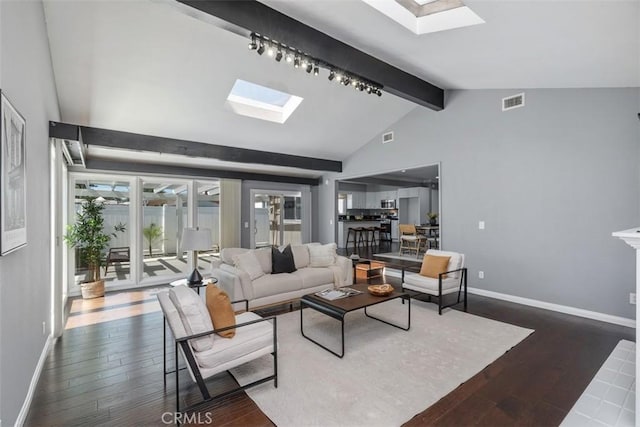 5337 Canehill Ave, Lakewood, CA 90713 - living area featuring a skylight and dark wood-style floors