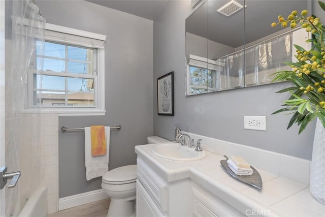 5337 Canehill Ave, Lakewood, CA 90713 - full bathroom with vanity and wood finished floors