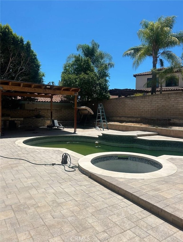 23774 Burton St, West Hills, CA 91304 - view of pool with a fenced backyard, an in-ground hot tub, a pergola, and a patio area