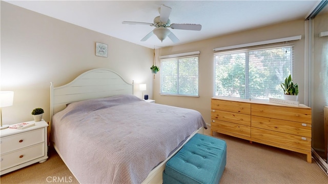 28305 Paseo El Siena Unit 10, Laguna Niguel, CA 92677 - bedroom with light colored carpet and a ceiling fan