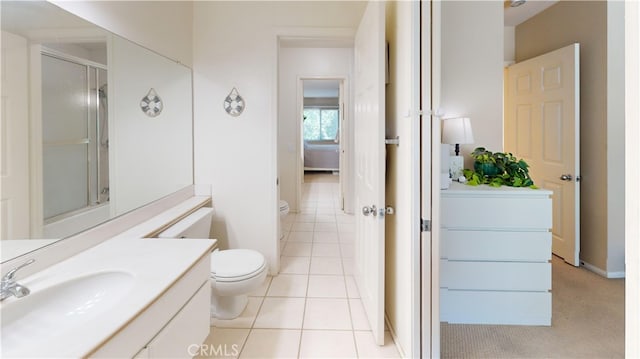 28305 Paseo El Siena Unit 10, Laguna Niguel, CA 92677 - bathroom with vanity, a shower with shower door, and tile patterned floors