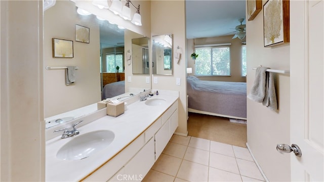 28305 Paseo El Siena Unit 10, Laguna Niguel, CA 92677 - ensuite bathroom featuring double vanity, tile patterned flooring, and ceiling fan