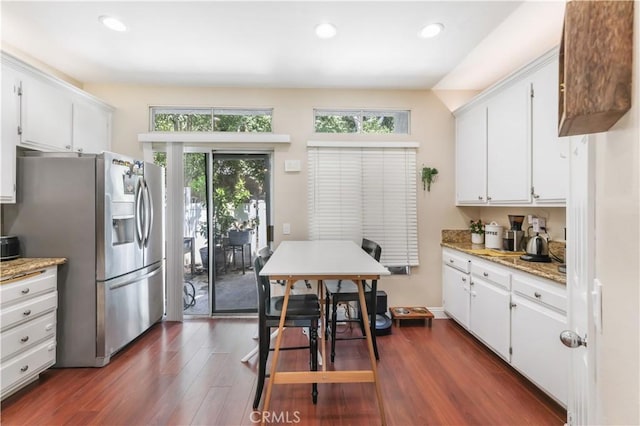 28305 Paseo El Siena Unit 10, Laguna Niguel, CA 92677 - kitchen with stainless steel fridge, dark wood-style floors, white cabinets, recessed lighting, and light stone countertops