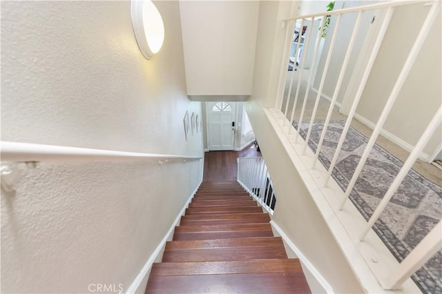 28305 Paseo El Siena Unit 10, Laguna Niguel, CA 92677 - stairway with wood finished floors and a textured wall