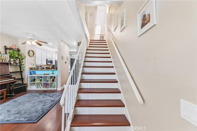 28305 Paseo El Siena Unit 10, Laguna Niguel, CA 92677 - staircase featuring a ceiling fan and wood finished floors