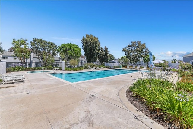 28305 Paseo El Siena Unit 10, Laguna Niguel, CA 92677 - community pool featuring a patio area and a residential view
