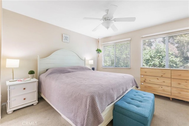 28305 Paseo El Siena Unit 10, Laguna Niguel, CA 92677 - bedroom featuring light colored carpet and ceiling fan