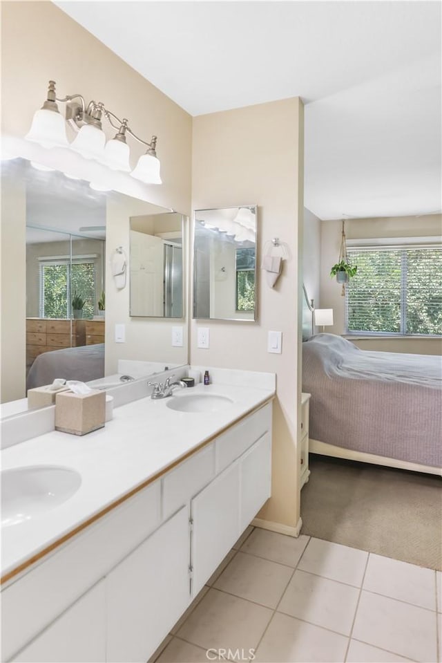 28305 Paseo El Siena Unit 10, Laguna Niguel, CA 92677 - bathroom with ensuite bathroom, double vanity, and tile patterned flooring