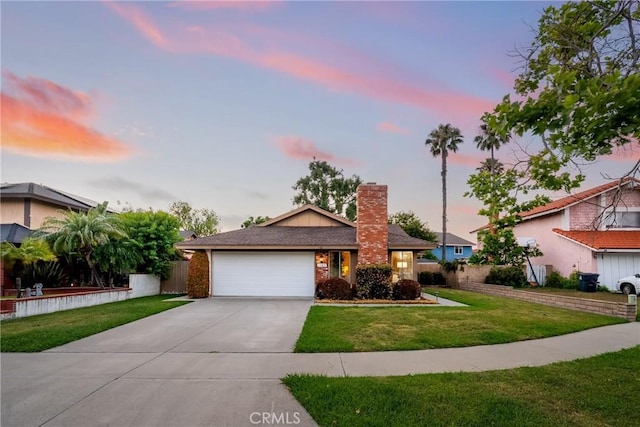 1109 Burns Ave, Santa Ana, CA 92707 - view of front of property featuring concrete driveway, an attached garage, and a chimney