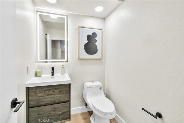 191 Desert Falls Cir, Palm Desert, CA 92211 - bathroom with vanity and wood finished floors