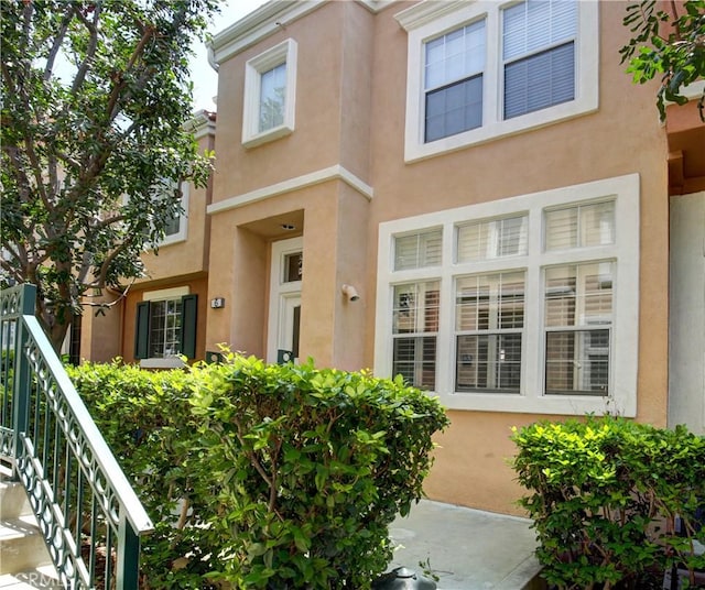 6 Garzoni Aisle, Irvine, CA 92606 - entrance to property featuring stucco siding