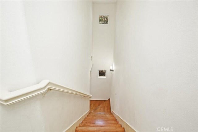 6 Garzoni Aisle, Irvine, CA 92606 - stairway featuring wood finished floors