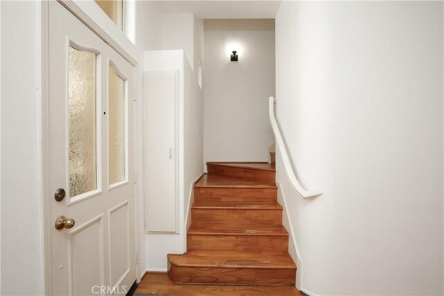 6 Garzoni Aisle, Irvine, CA 92606 - stairway featuring wood finished floors