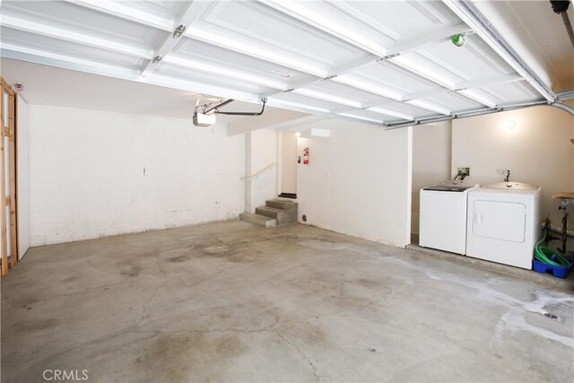 6 Garzoni Aisle, Irvine, CA 92606 - garage with washer and dryer and a garage door opener