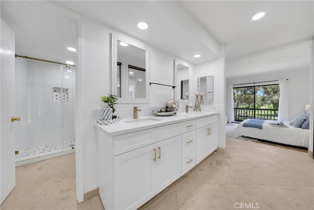 20 Nuevo Unit 10, Irvine, CA 92612 - bathroom featuring double vanity, a stall shower, recessed lighting, and ensuite bathroom