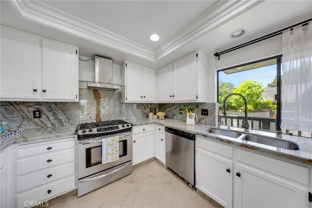 20 Nuevo Unit 10, Irvine, CA 92612 - kitchen featuring stainless steel appliances, wall chimney range hood, ornamental molding, backsplash, and light stone countertops