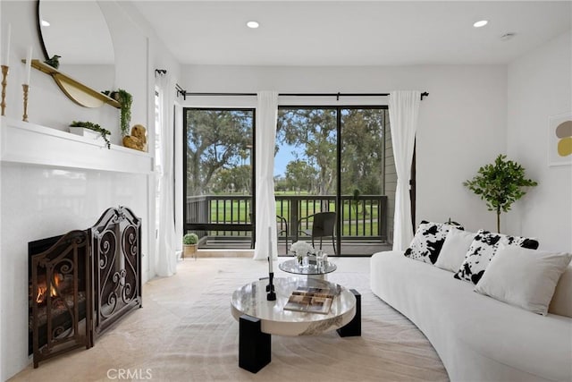 20 Nuevo Unit 10, Irvine, CA 92612 - living area with recessed lighting and a warm lit fireplace