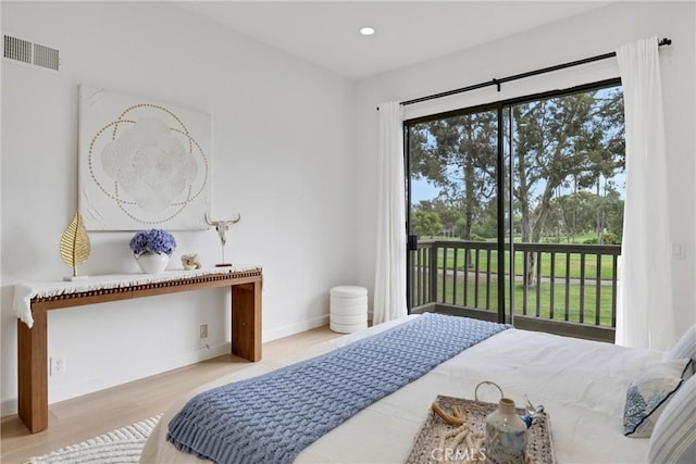 20 Nuevo Unit 10, Irvine, CA 92612 - bedroom featuring access to exterior, wood finished floors, and recessed lighting