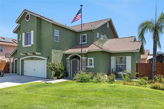 6 N Post Ave, Sanger, CA 93657 - view of front of home with stucco siding, driveway, an attached garage, and a tile roof