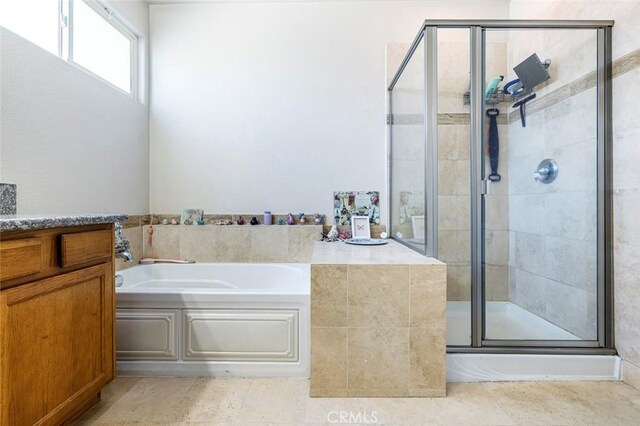 6 N Post Ave, Sanger, CA 93657 - bathroom featuring a garden tub, a shower stall, and vanity