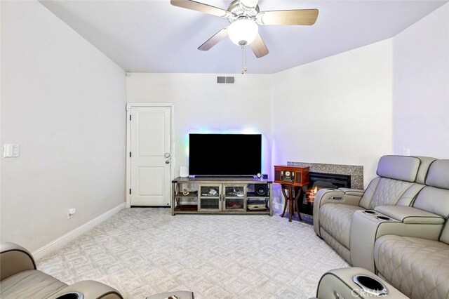 6 N Post Ave, Sanger, CA 93657 - living room featuring carpet, ceiling fan, and a glass covered fireplace