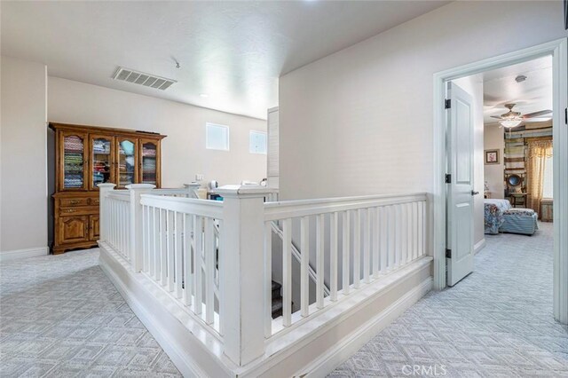 6 N Post Ave, Sanger, CA 93657 - hallway featuring carpet floors and an upstairs landing