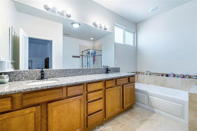 6 N Post Ave, Sanger, CA 93657 - full bath featuring a stall shower, double vanity, and a garden tub