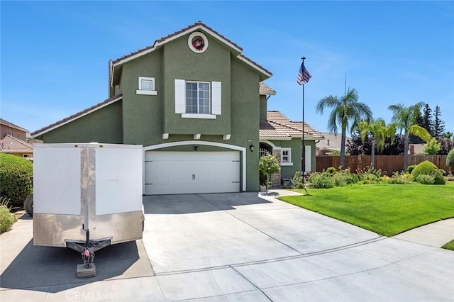 6 N Post Ave, Sanger, CA 93657 - view of front of home featuring a tile roof, stucco siding, a garage, and driveway