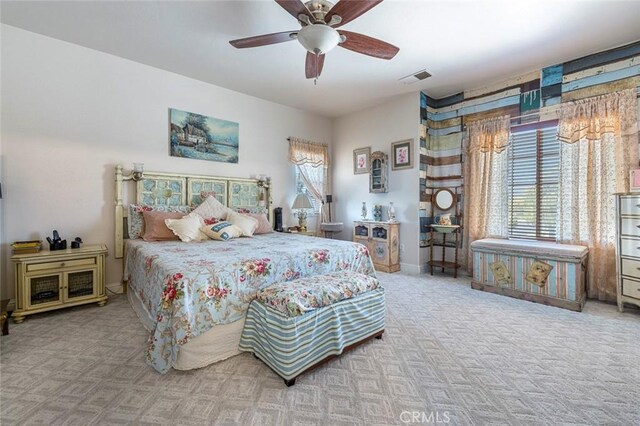 6 N Post Ave, Sanger, CA 93657 - carpeted bedroom featuring multiple windows and a ceiling fan