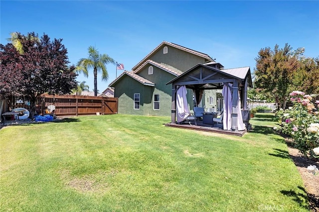 6 N Post Ave, Sanger, CA 93657 - back of property with a gazebo and stucco siding