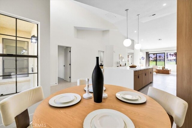 42407 Liolios Dr, Palm Desert, CA 92211 - dining space featuring high vaulted ceiling