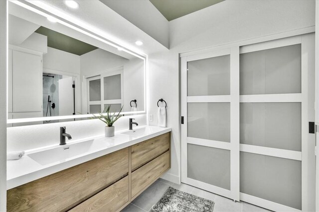 42407 Liolios Dr, Palm Desert, CA 92211 - full bathroom with double vanity and an enclosed shower