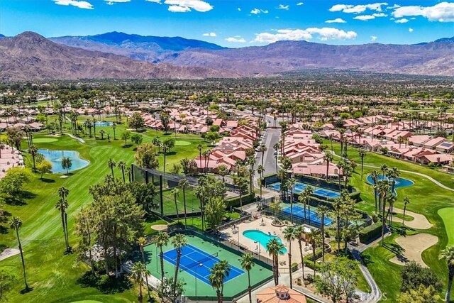 42407 Liolios Dr, Palm Desert, CA 92211 - aerial perspective of suburban area with a golf course and a water and mountain view