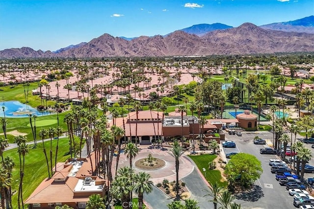 42407 Liolios Dr, Palm Desert, CA 92211 - aerial perspective of suburban area with a golf course and a water and mountain view