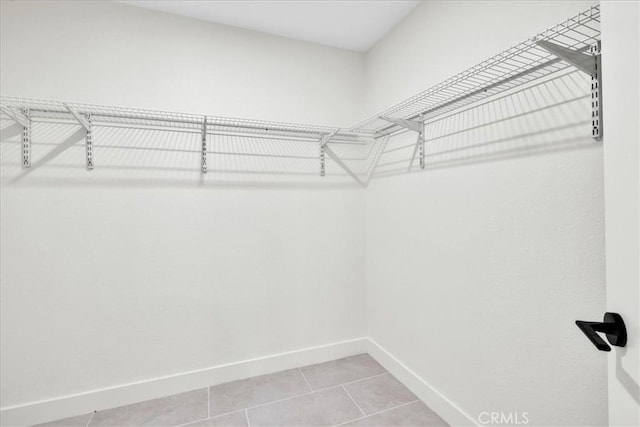42407 Liolios Dr, Palm Desert, CA 92211 - spacious closet with tile patterned floors