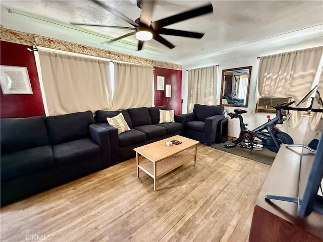 1246 W Mill St, San Bernardino, CA 92410 - living area with a ceiling fan and light wood-style flooring