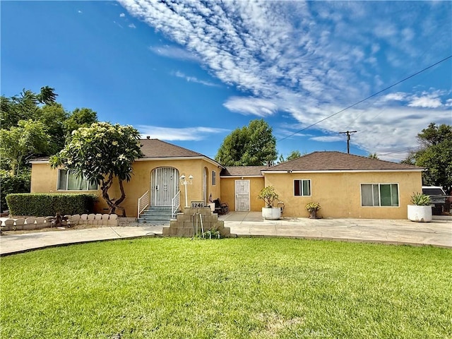 1246 W Mill St, San Bernardino, CA 92410 - view of front of property with stucco siding and a front yard