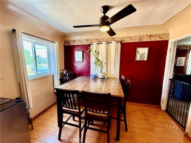 1246 W Mill St, San Bernardino, CA 92410 - dining room with light wood-style floors and ceiling fan