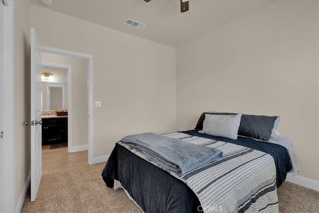 2454 W Mallard Ln, Hanford, CA 93230 - bedroom with light carpet and ceiling fan