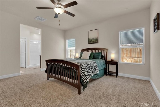 2454 W Mallard Ln, Hanford, CA 93230 - carpeted bedroom with baseboards and ceiling fan