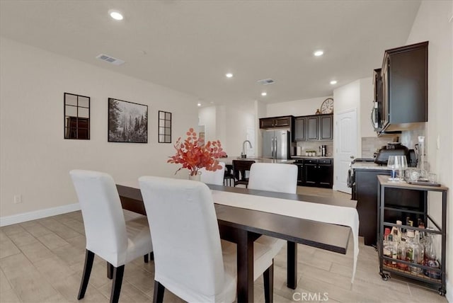 2454 W Mallard Ln, Hanford, CA 93230 - dining space with recessed lighting and baseboards